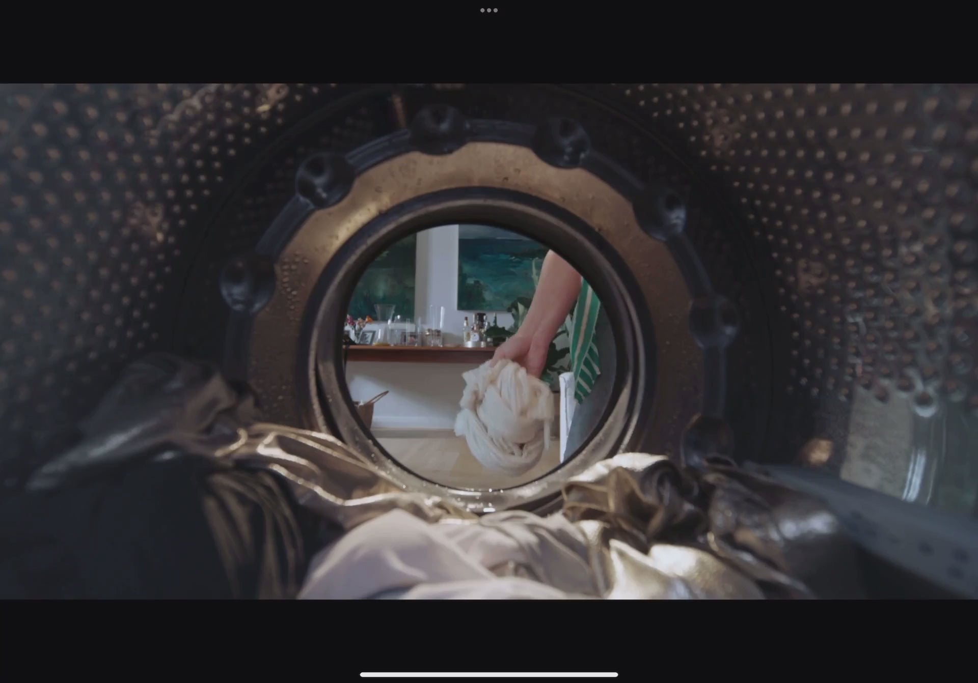 Portaboo Washeen product video showing the inner view of a traditional washing machine with a text overlay 'laundry redefined,' illustrating how Washeen revolutionizes the laundry process.